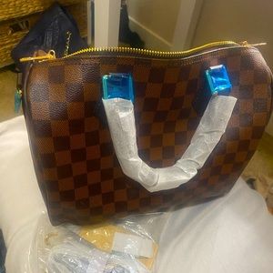 Designer brown checkered bag brand new